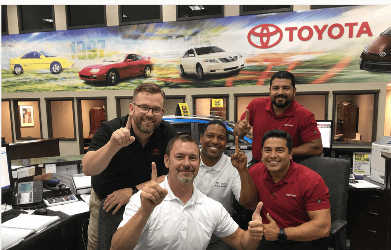 John Schibi with his dealership team at Cobb County Toyota